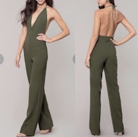 a woman in a green jumpsuit with a halter top