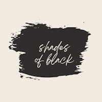 a black brush stroke with the words shades of black