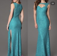 a teal lace dress with a slit and a slit