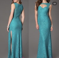 a teal lace dress with a slit and a slit